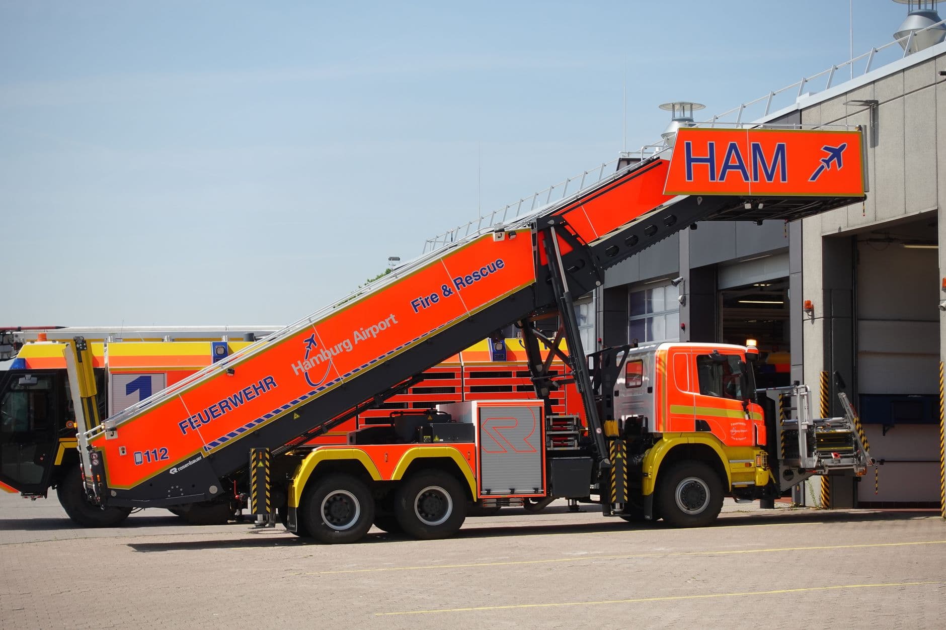 Hamburg Airport fire truck positioned at the terminal for emergency response duties.